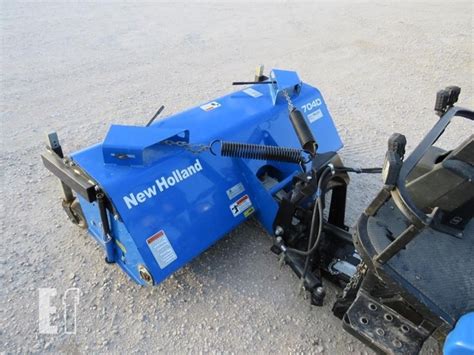 new holland skid steer snow plow|new holland mc28 attachments.